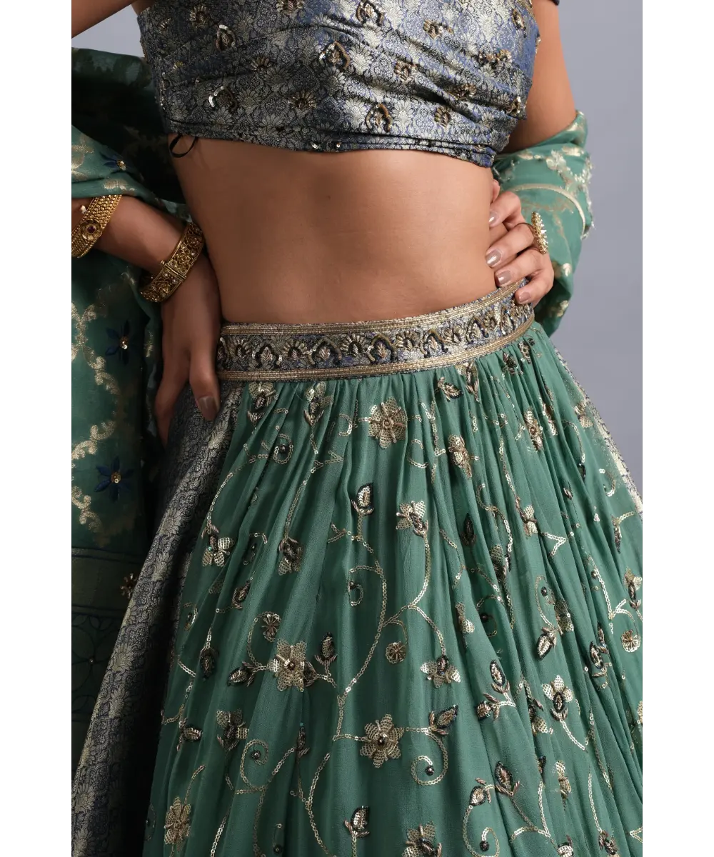 AASTHA SOOD - Teal green georgette Zardozi Lehenga